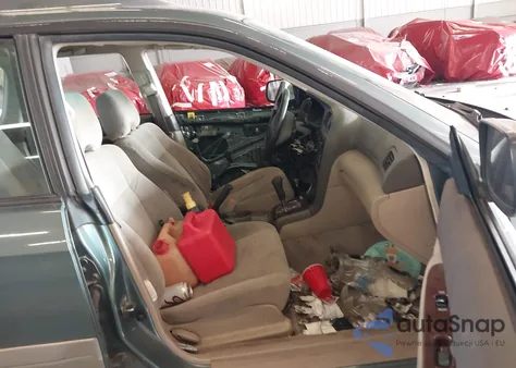 2002 Subaru Legacy из США, поврежденный, VIN 4S3BH665027608733